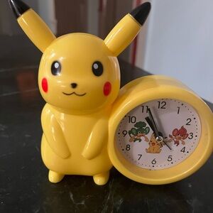 Pokemon Pikachu Seiko analog alarm clock. Bright and colorful works great!